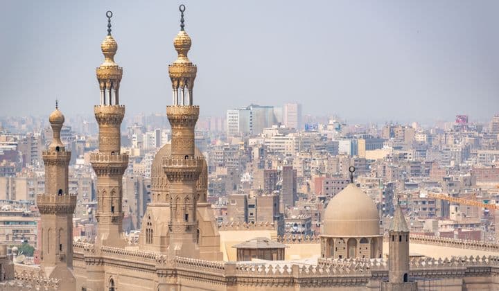 Scenic aerial shot of intricate Islamic architecture with cityscape in Cairo, Egypt.
