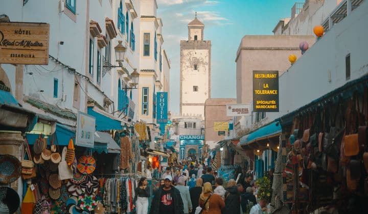Bustling scene of Essaouira's Medina street market, showcasing local trade and culture.