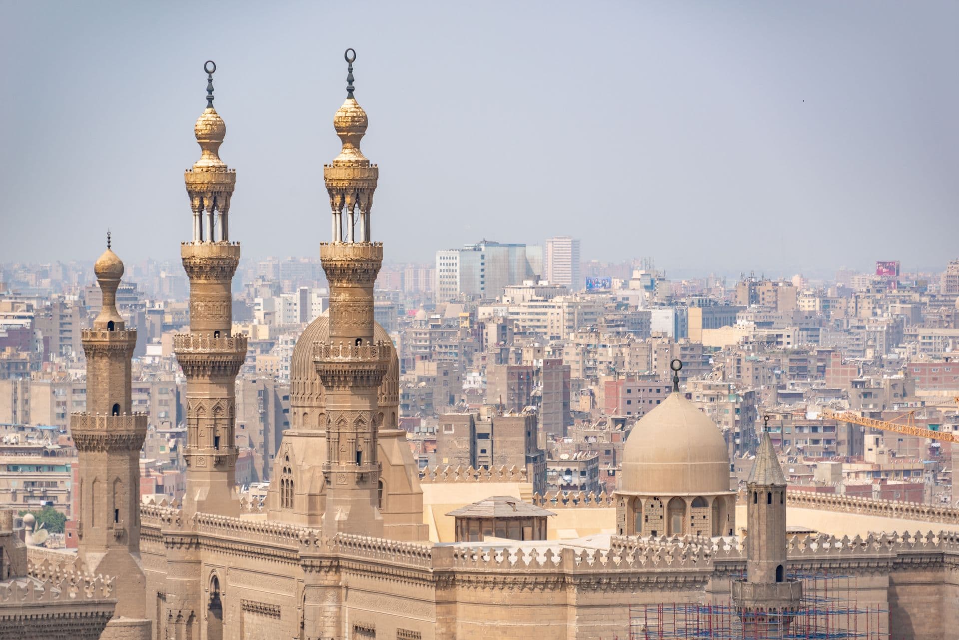 Scenic aerial shot of intricate Islamic architecture with cityscape in Cairo, Egypt.